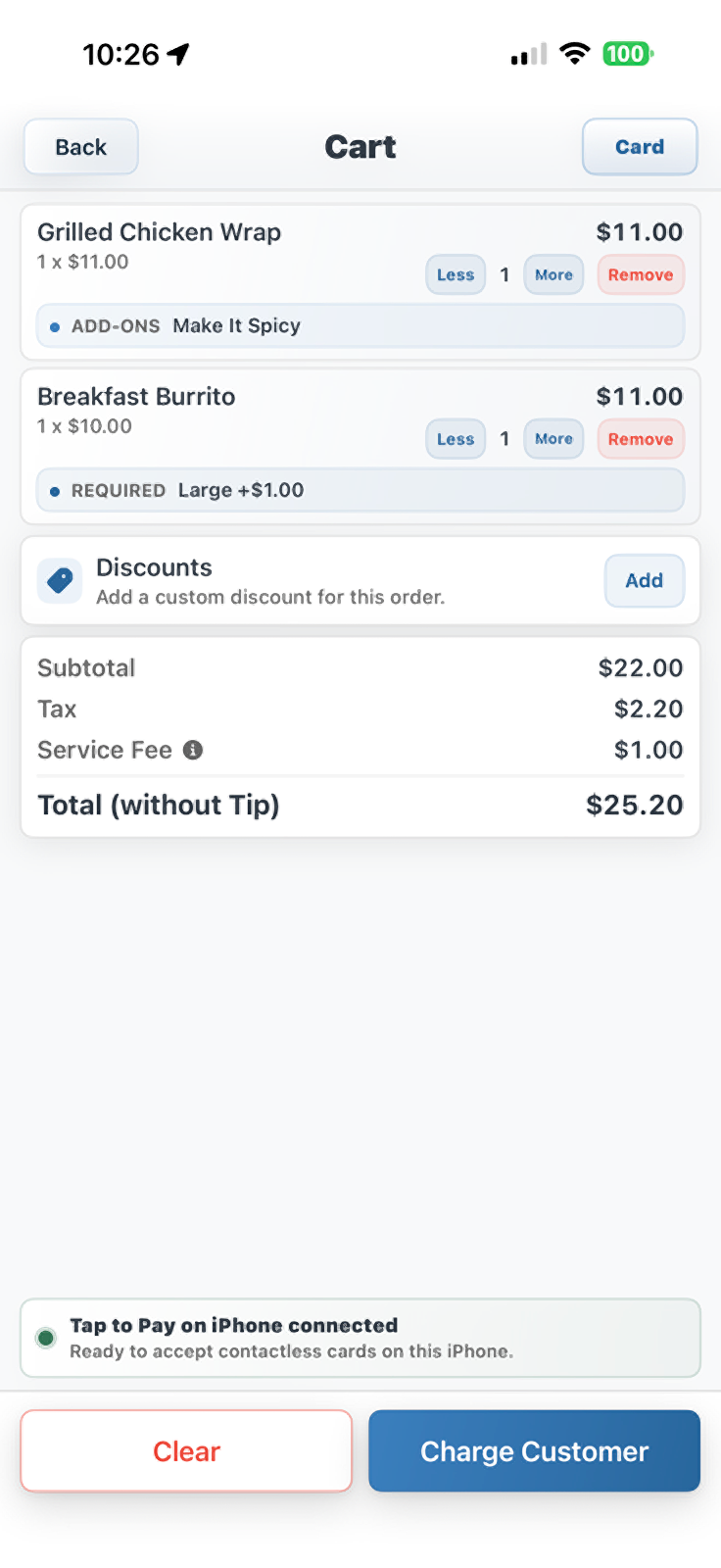 TABL Mobile cart: two items with an add-on and a required modifier, a $1.00 service fee, and Tap to Pay on iPhone connected above the Charge Customer button